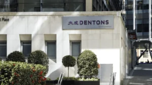 SRA Triumphs as Justice Lang Remits Dentons AML Case to New Tribunal Panel 